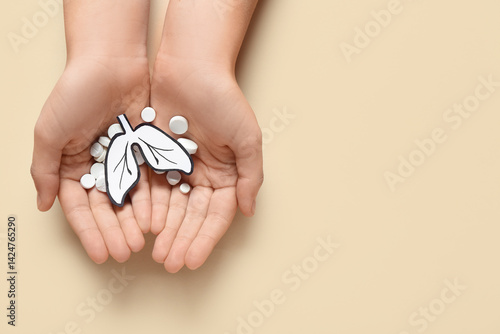 Female hands with paper lun...