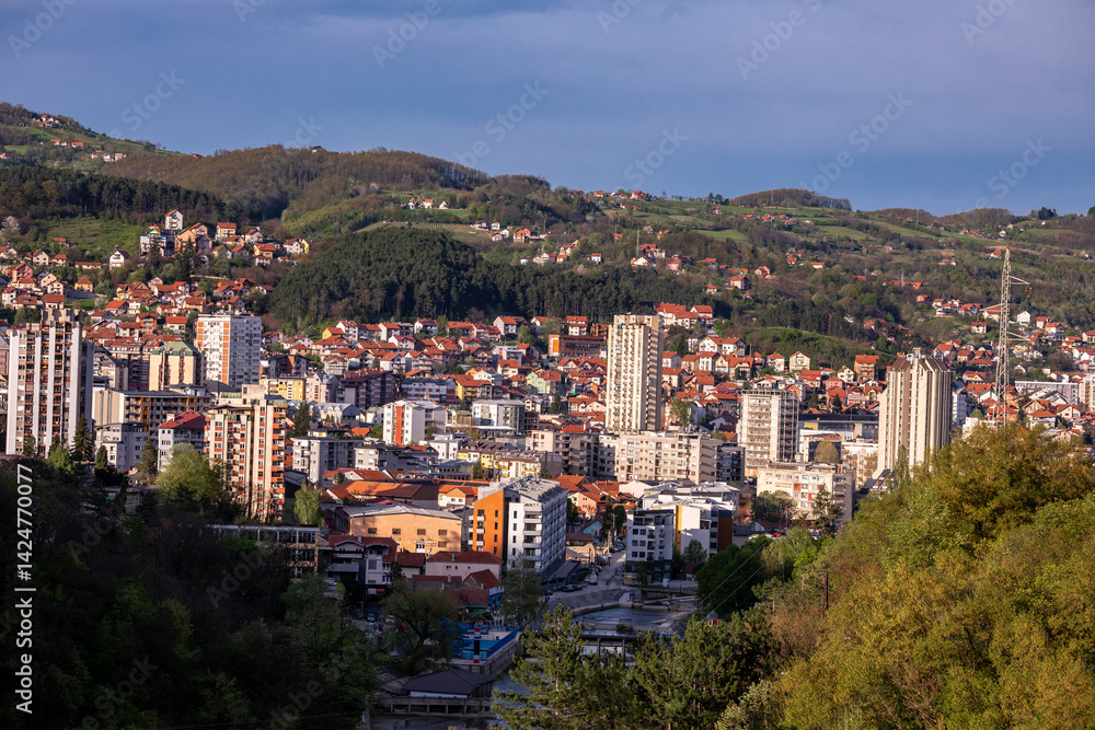 Obraz premium Užice, a town in Serbia on the banks of the Djetinja River, surrounded by mountains and rocks