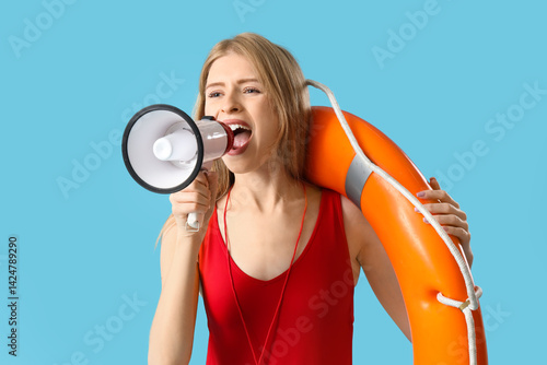 Young female lifeguard with...