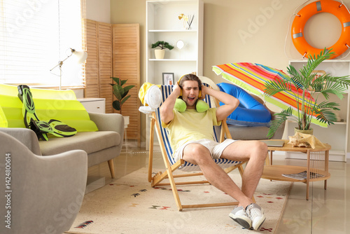 Male tourist with headphone...