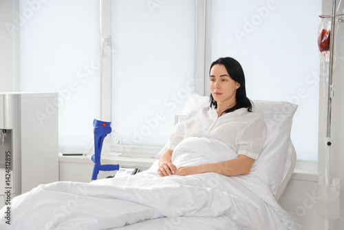 Female patient lying on bed...