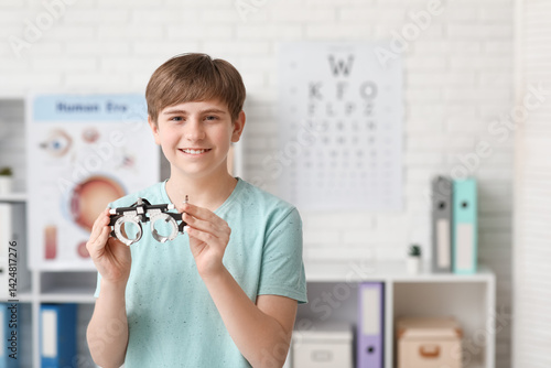 Little boy with optical tri...