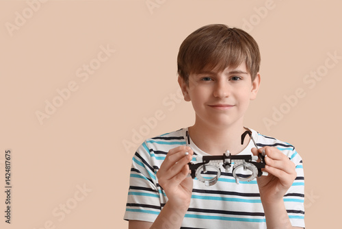 Little boy with optical tri...