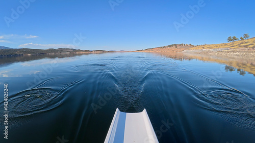 Slika na platnu winter rowing on calm Carter Lake in Colorado - POV rower perspective