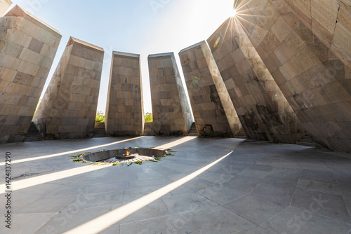 Obraz na płótnie Yerevan, Yerevan Province, Armenia. The eternal flame with flowers, in the Memorial Hall at the Tsitsernakaberd Armenian Genocide Memorial Complex. w salonie