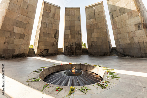 Obraz na płótnie Yerevan, Yerevan Province, Armenia. The eternal flame with flowers, in the Memorial Hall at the Tsitsernakaberd Armenian Genocide Memorial Complex. w salonie