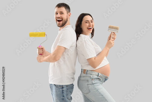 Young pregnant couple with ...