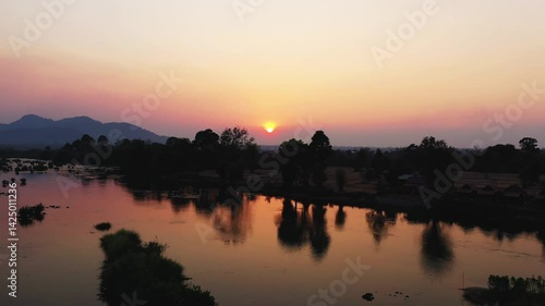 The sandy banks of the Mekong River in Asia, Laos, Champasak, the 4000 Islands, Don Det, at sunset. 