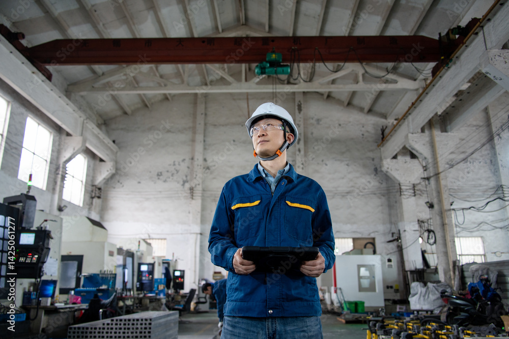 asian male engineer working in factroy asian male engineer working in factroy
