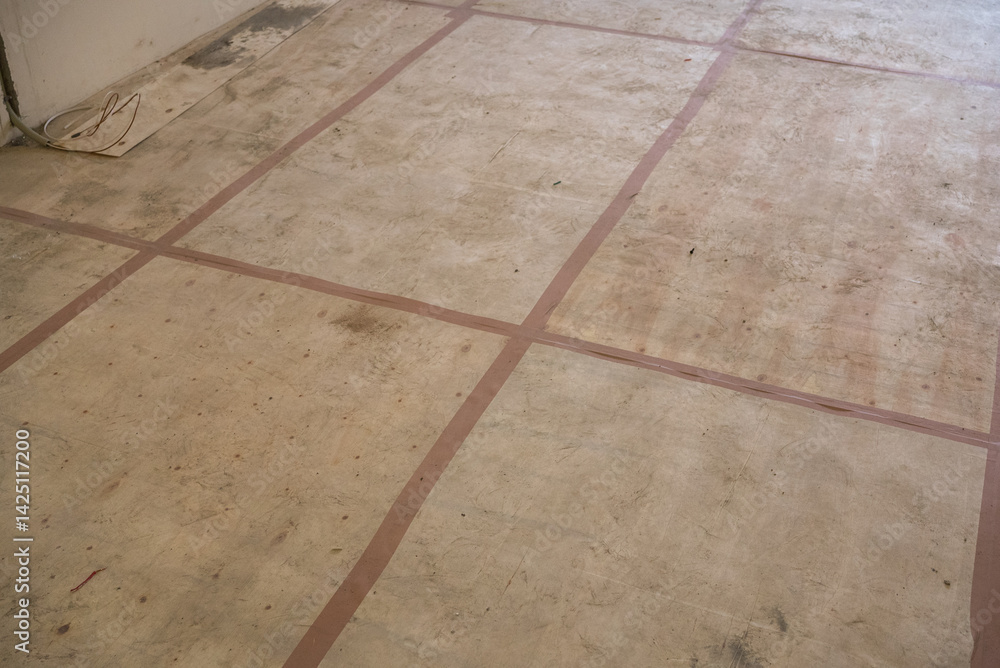 Room under renovation with unfinished walls and floor