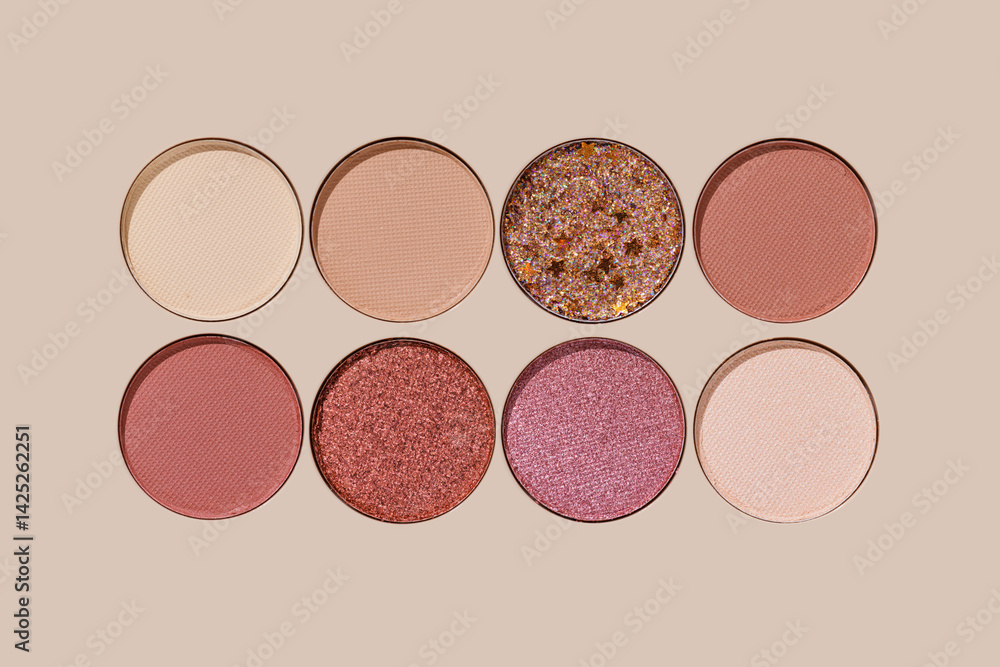 Eyeshadow palette, mix of glitter, matte shades in beige, brown, pink, purple hues. Minimal top view pattern for beauty, makeup, cosmetic themes, Vivid color swatches eyeshade refills round shape