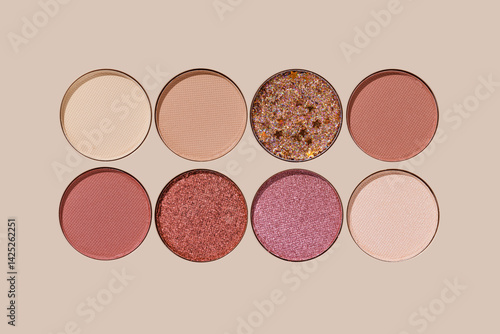 Obraz na płótnie Eyeshadow palette, mix of glitter, matte shades in beige, brown, pink, purple hues. Minimal top view pattern for beauty, makeup, cosmetic themes, Vivid color swatches eyeshade refills round shape w salonie