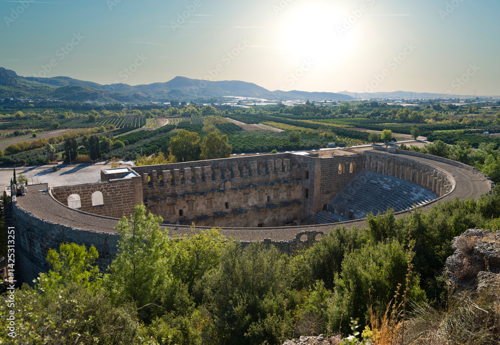 Panoramic view of the Roman Theatre in the ancient city of Aspendos. Antalya city, Turkey country Panoramic view of the Roman Theatre in the ancient city of Aspendos. Antalya city, Turkey country