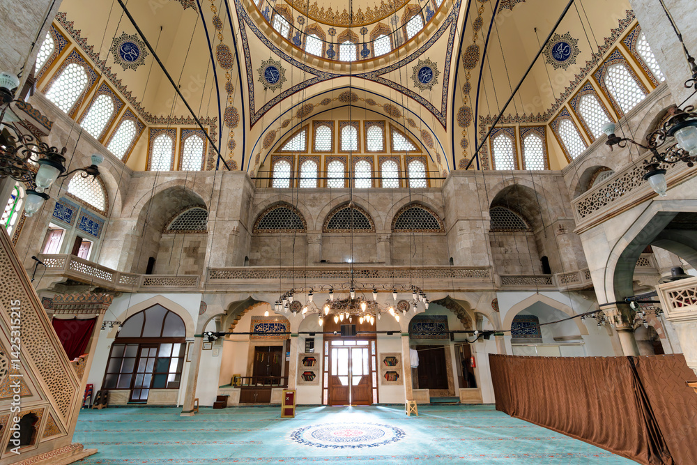 Obraz premium Muradiye Mosque stands as a remarkable example of Ottoman architecture in Manisa, Turkey. Constructed in the 1500s, its intricate domes and elegant interiors attract tourists and worshippers alike