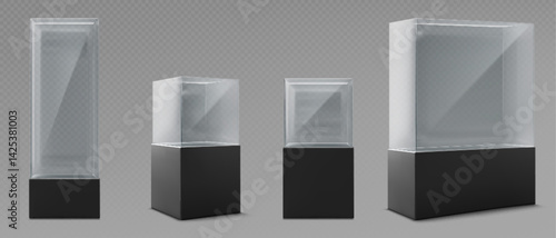 Glass museum display cases set - various sized transparent rectangular boxes with black bases. Tall narrow vitrine, low wide pedestal, square cube for exhibiting art objects, jewelry. Empty showcases.