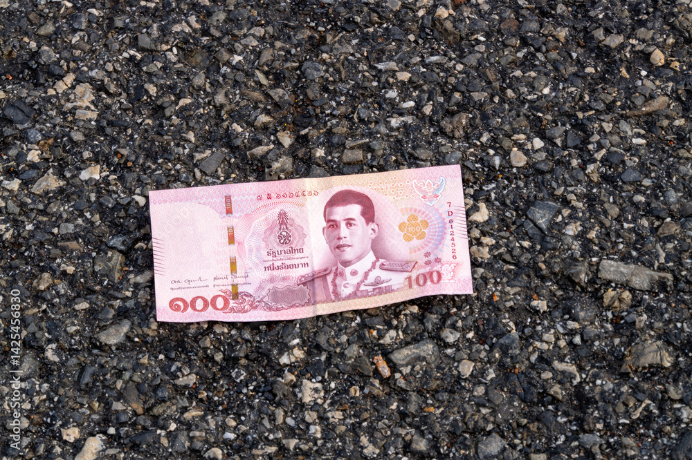 Lost thai baht note asphalt street urban setting perspective financial context