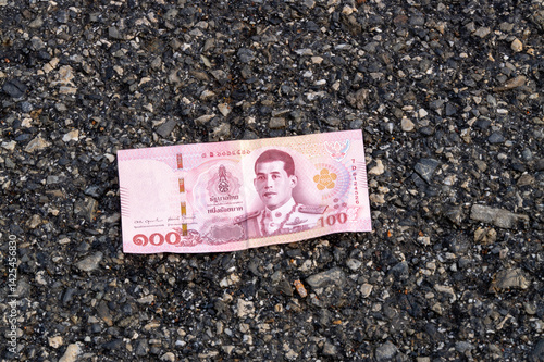 Obraz na płótnie Lost thai baht note asphalt street urban setting perspective financial context w salonie