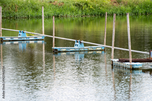 Obraz na płótnie Fishing equipment floating calm water in scenic nature environment tranquil viewpoint w salonie