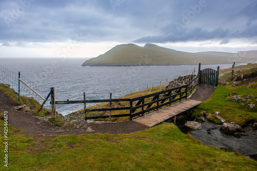Trollkonufingur, Witch's Finger Trail in Vagar Island, Feroe Islands. Scenic, iconic landscape