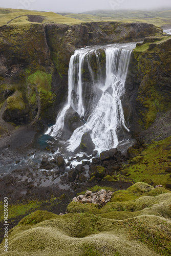 Obraz na płótnie Fagrifoss waterfall. Mossy rocky landscape in Lakagigar. South area. Iceland w salonie