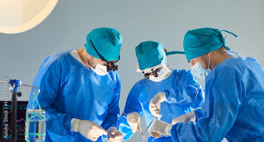 Group of a surgeons conducts operation in hospital room, focusing on surgery and medical care for patient in emergency, ensuring protection in a professional setting with precision.