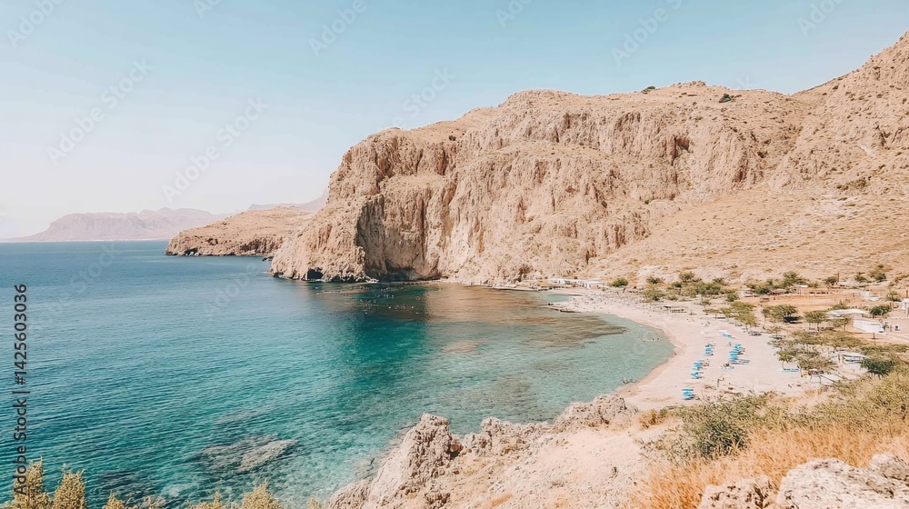 Obraz premium Picturesque coastal view of a secluded bay. A tranquil beach nestled within a dramatic cliffside setting