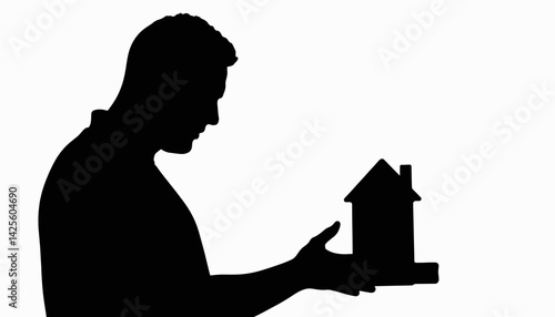 Man contemplating new home purchase with key, real estate investment