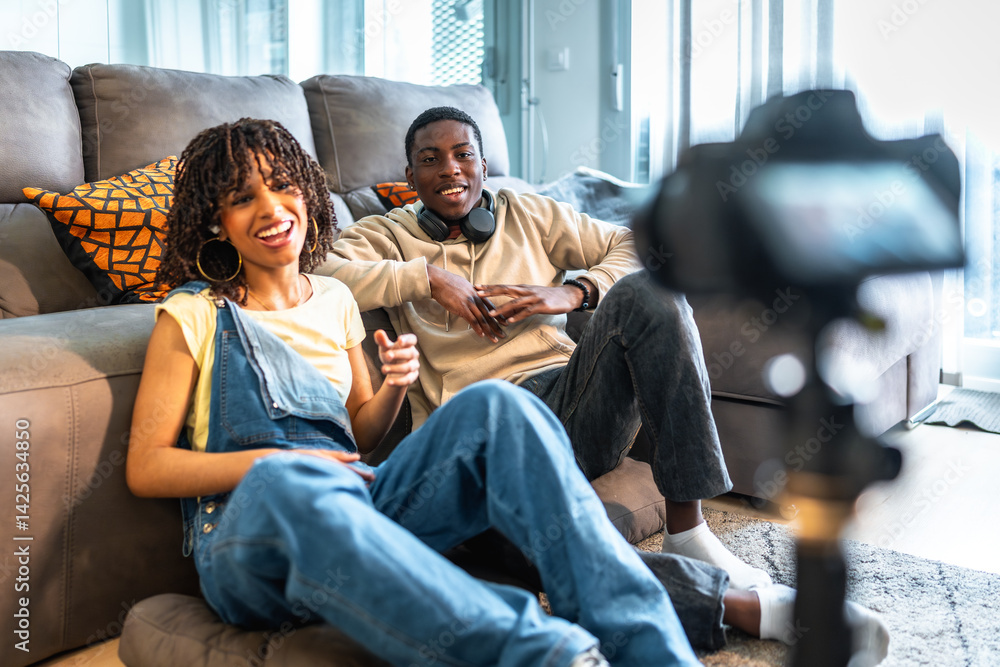 Content creators recording video blog from home