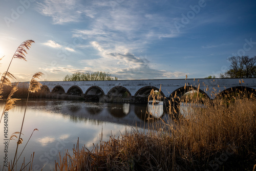Hungarian nature landscape, Shadoof, Hortobagy, clouds, bridge, road, sunrise