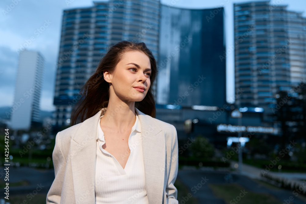 confident woman in beige blazer with city buildings background smiling outdoors modern lifestyle business concept confident woman in beige blazer with city buildings background smiling outdoors modern lifestyle business concept