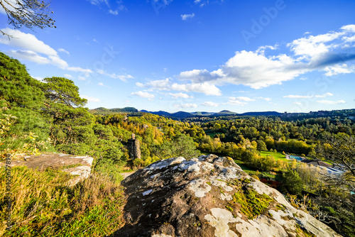 View of the surrounding landscape from the Pfaffenfelsen near Dahn. Nature with hills and forests in the Palatinate region. Lookout rock with panoramic views.
