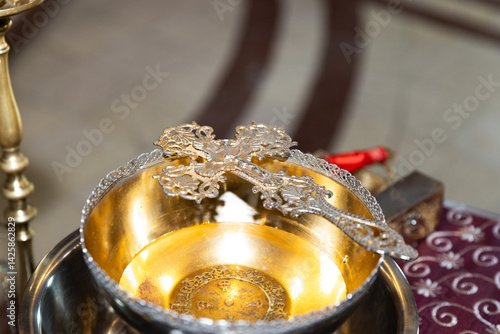 Golden Cross in Silver Bowl with Holy Water for Orthodox Baptism