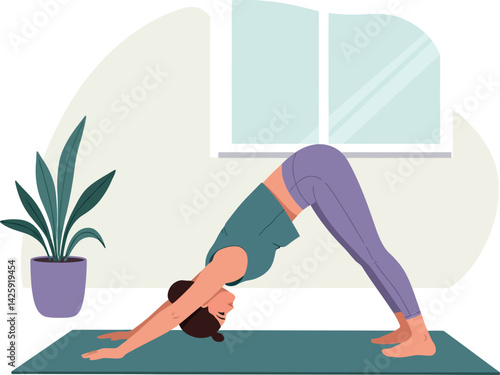 Woman practicing downward dog yoga pose indoors on mat with plant and window background