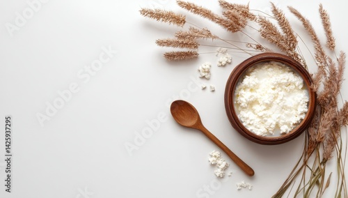 Wallpaper Mural Creamy Cottage Cheese Bowl with Wooden Spoon and Dried Flowers: Rustic Dairy Delight Torontodigital.ca
