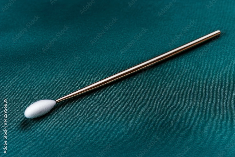 Photograph of a cotton swab on a solid teal background, representing a minimalist medical style, in white and clean, with ample copyspace Photograph of a cotton swab on a solid teal background, representing a minimalist medical style, in white and clean, with ample copyspace