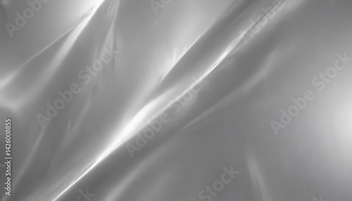 Abstract silver foil, sleek metallic texture with highlights and shadows,  aluminum,  reflection,  gleam