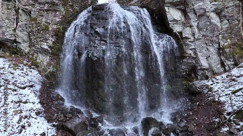 Snowy Waterfall in the Japanese Mountains – Early Spring Thaw in a Rugged Landscape