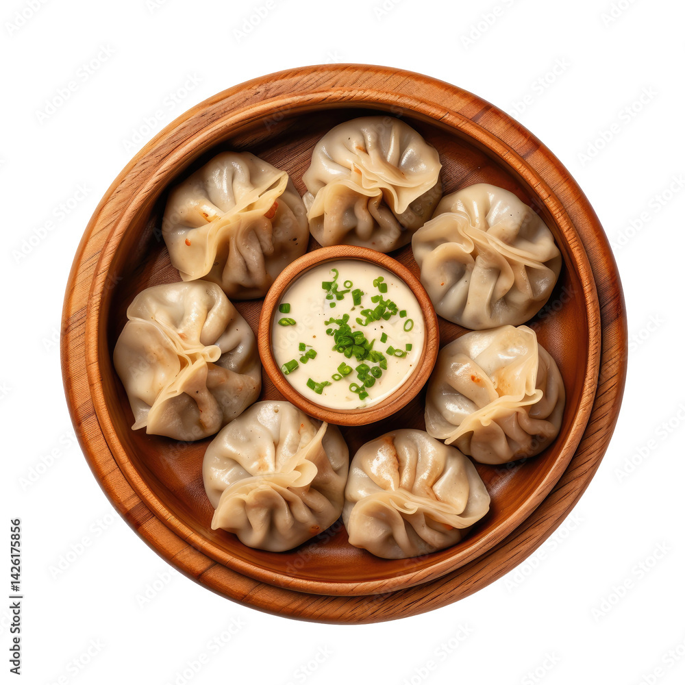 Fototapeta premium Dumpling momos with sauce in a wooden plate top view isolated on transparent white background, clipping path