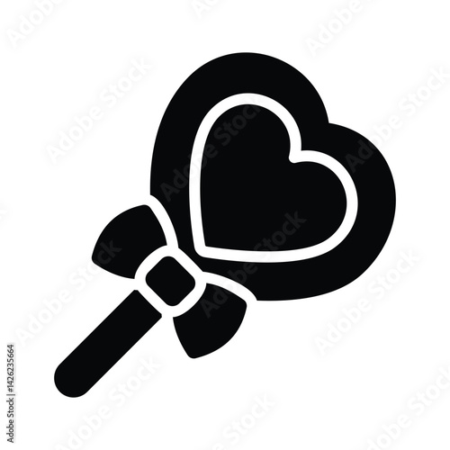 Easy to use glyph style icon denoting heart lollipop