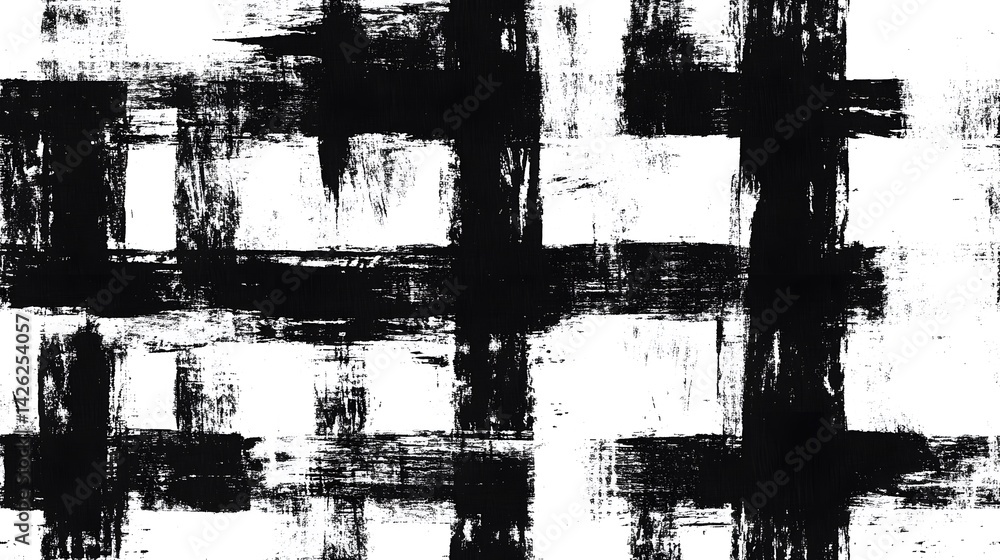 Fototapeta premium Abstract black brushstrokes create a patterned texture.