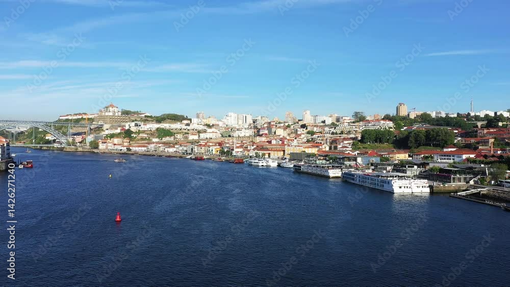 The Luis I Bridge is part of the historic heart of Porto, in Europe, Portugal, in the North, in summer, on a sunny day. The Luis I Bridge is part of the historic heart of Porto, in Europe, Portugal, in the North, in summer, on a sunny day.
