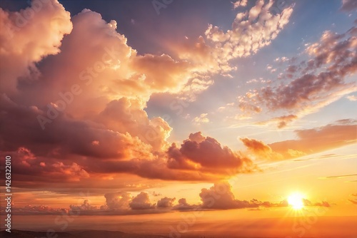 Fototapeta Naklejka Na Ścianę i Meble -  Stunning sky at sunrise with a mix of clouds and warm golden hues. (Background)