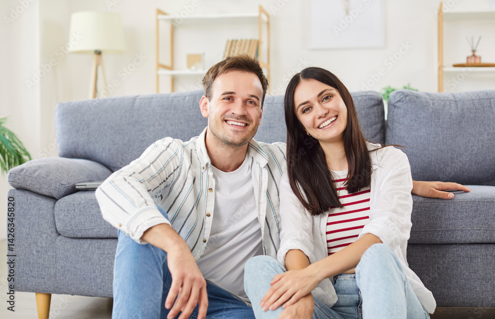 Loving smiling family healthy relationship, sitting close at home, married couple after buying house, happy mortgage agreement, apartment renters, apartment owners, relocation tenant service