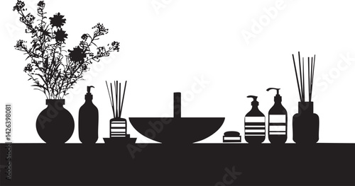 Silhouette of a bathroom countertop with sink, flower vase, soap dispensers, and reed diffusers in black and white.