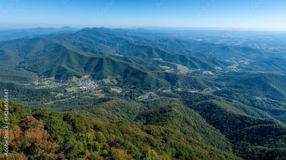 Panoramic view of a vast mountain range, lush green valleys, and distant cityscape under a clear blue sky. Panoramic view of a vast mountain range, lush green valleys, and distant cityscape under a clear blue sky.
