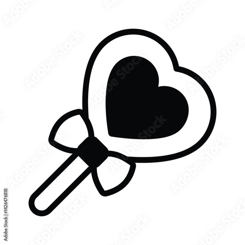 Easy to use glyph style icon denoting heart lollipop
