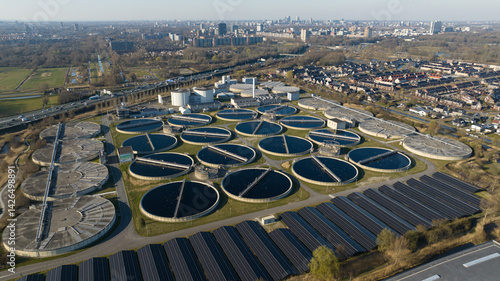 Photos waste water treatment plant, clean and safe drinking water to communities, remove impurities and contaminants from water sources, such as rivers, lakes, or groundwater