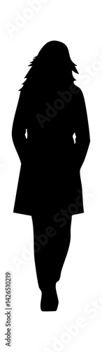 Silhouette of a woman walking with hands in pockets, exuding confidence and mystery.