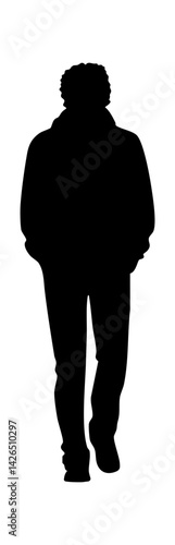 Silhouette of a young man walking, creating a mysterious and contemplative atmosphere.