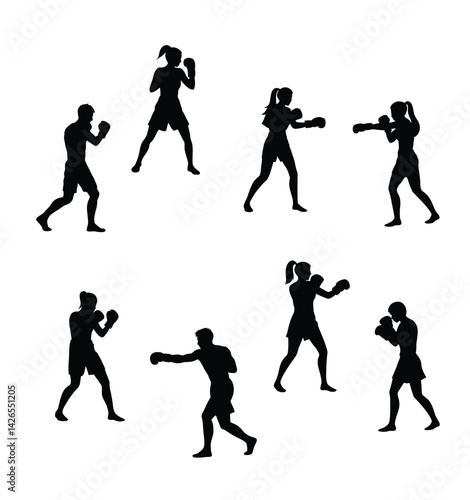 Set of silhouettes of boxer fighting